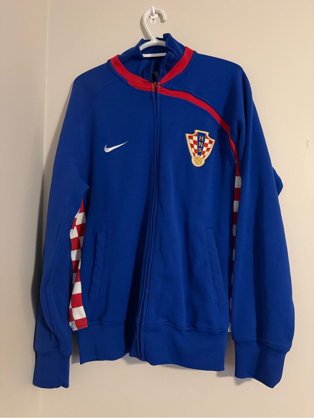 Nike Blue Full-Zip Kids Soccer Jacket with Red Trim and Crest